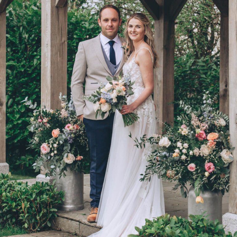 A beautiful wedding scene with a floral design created by Artem Florum