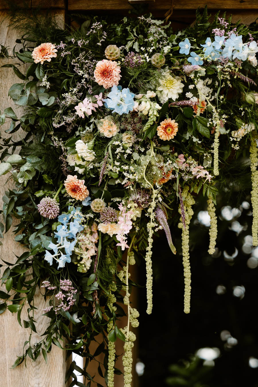 A pastel hanging bouquet created by Artem Florum at the Enchanted Arbour at Trevenna Barns, Cornwall.