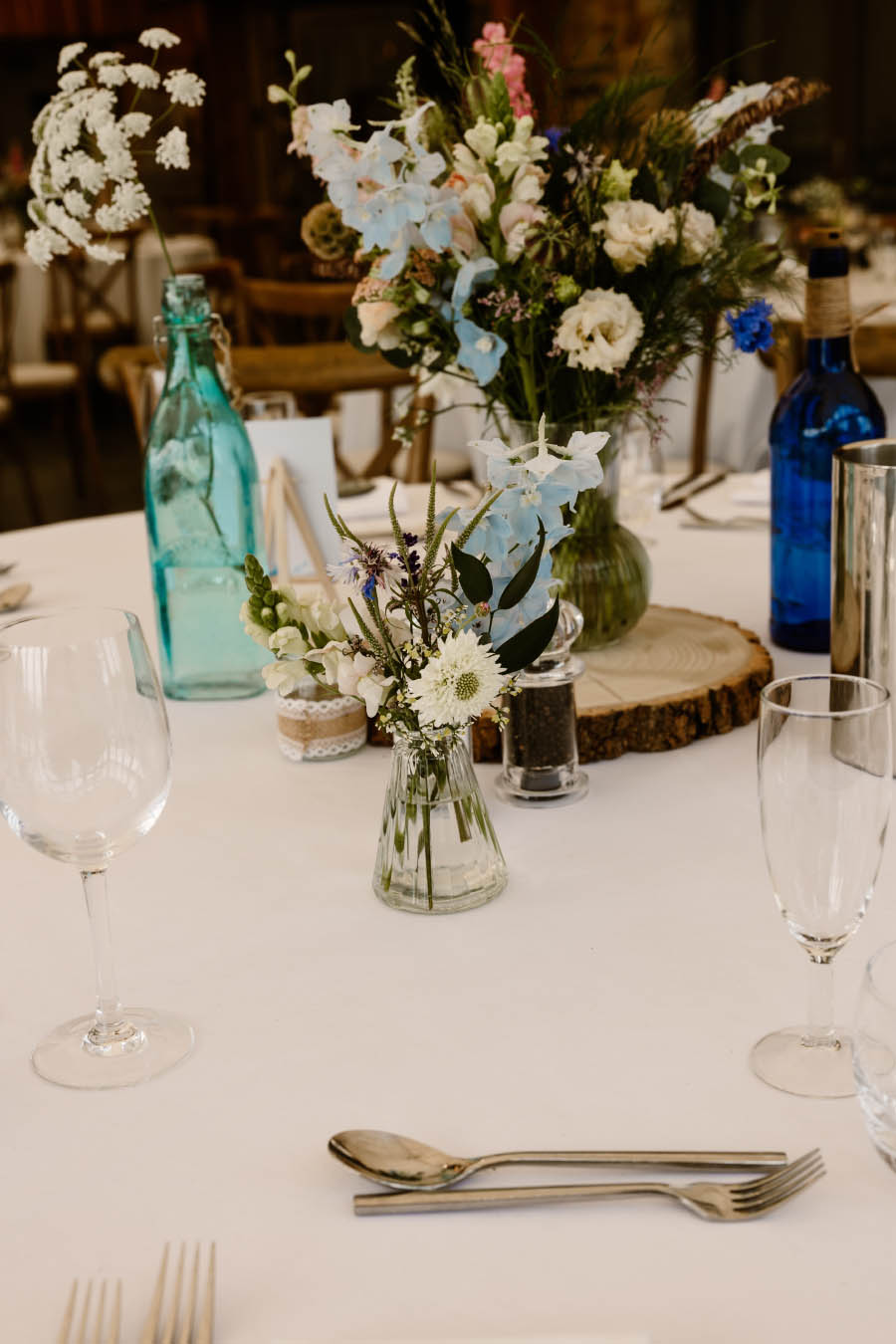 A splendid decorated wedding table with posies designed and created by Artem Florum.